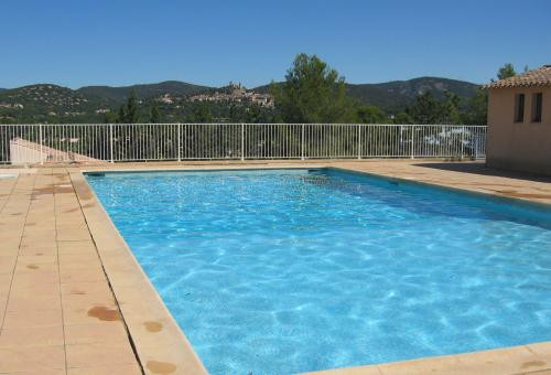 Nice terraced house in a residence with a pool