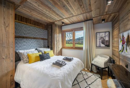 Chic et moderne chalet avec un espace bien-être et une vue panoramique sur...